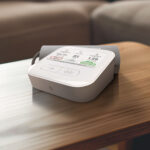 The CONNEQT Pulse sitting on a wood table.